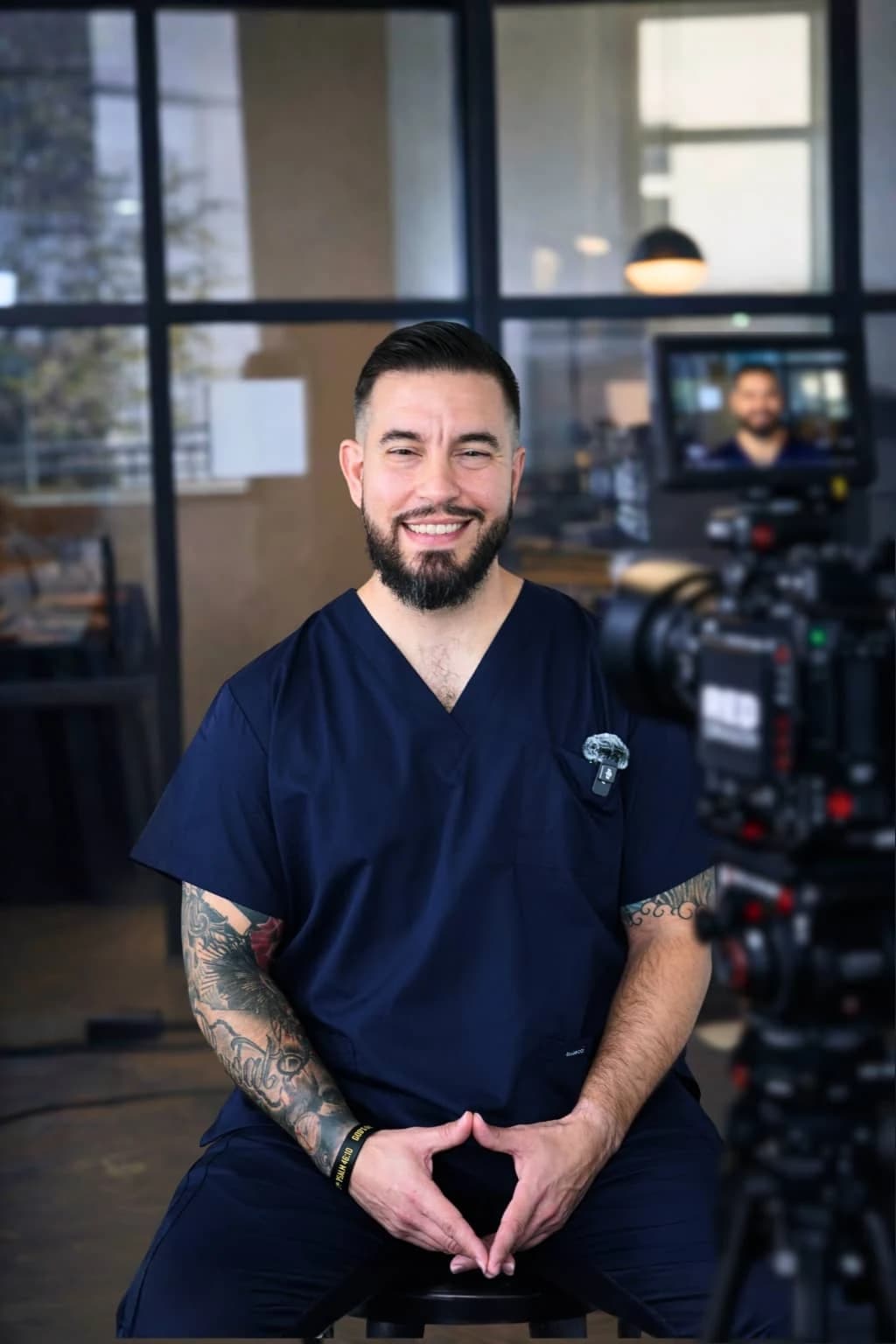 Physician on set filming medical content